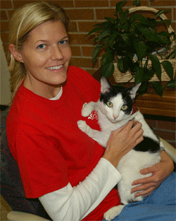 Amber Landacre with  a kitty.