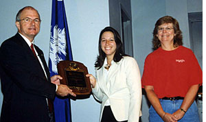 Dr. Booth presenting an award