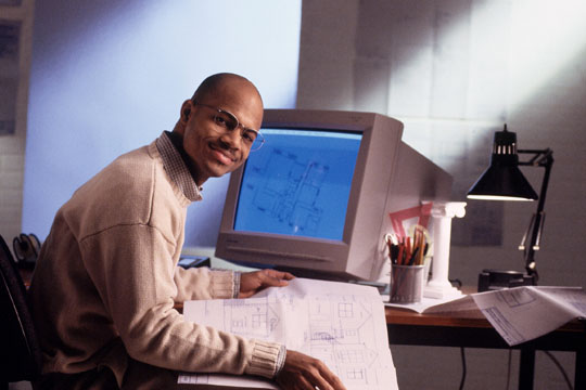 male CAD designer at computer